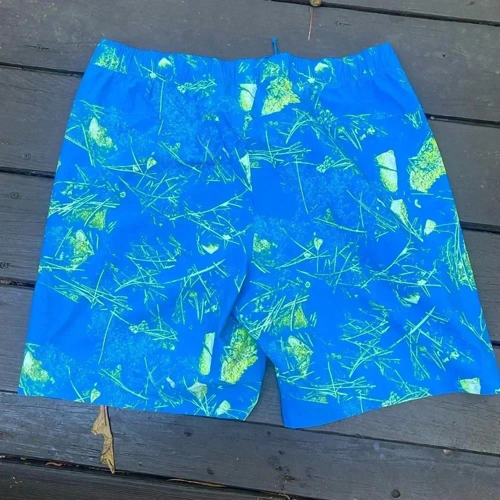 North Face mens blue and green design shorts size large